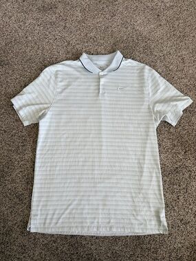 Nike Golf Polo with Subtle stripes. Size Medium.